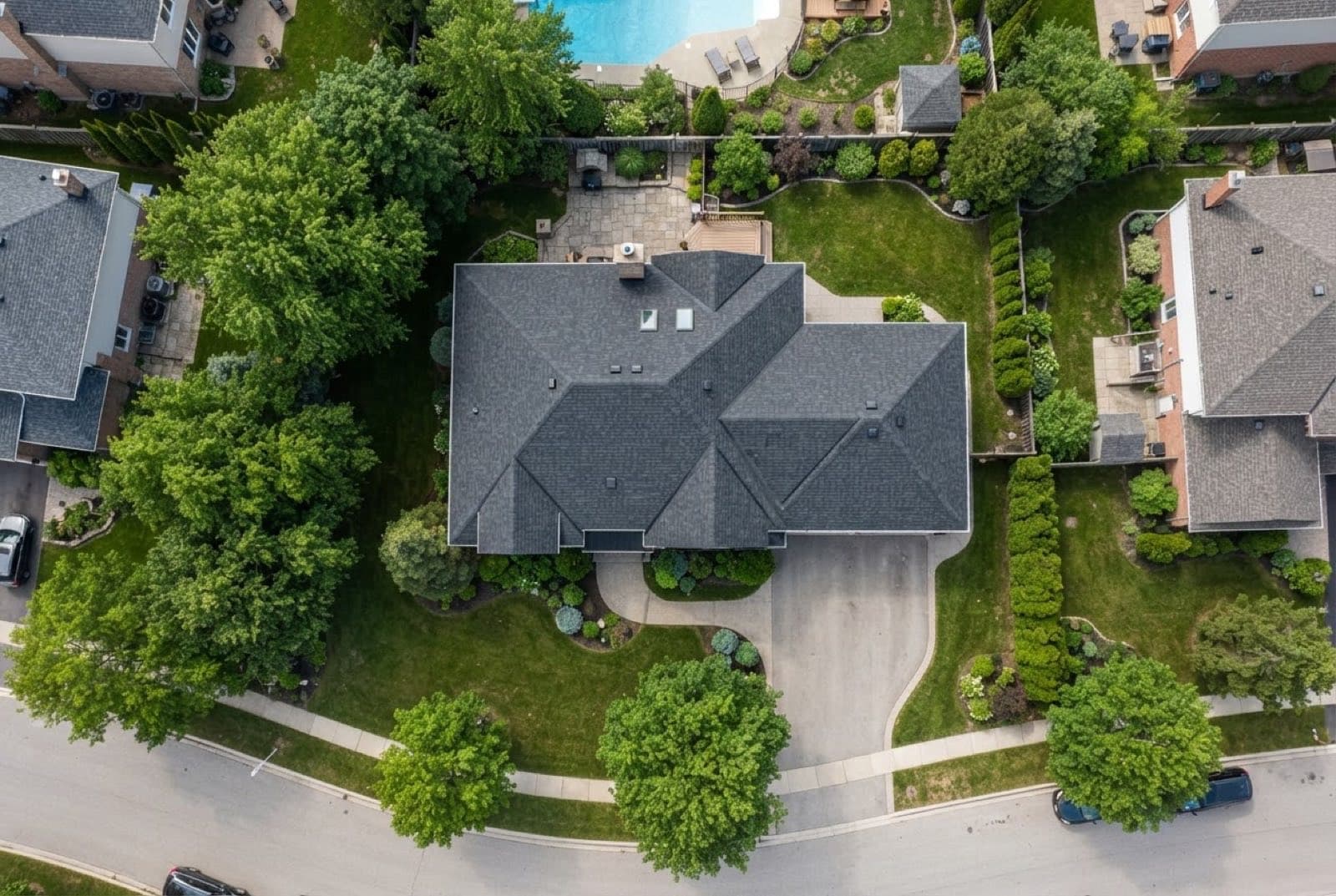 Overhead aerial view of a home's asphalt shingle roof used for satellite measurement